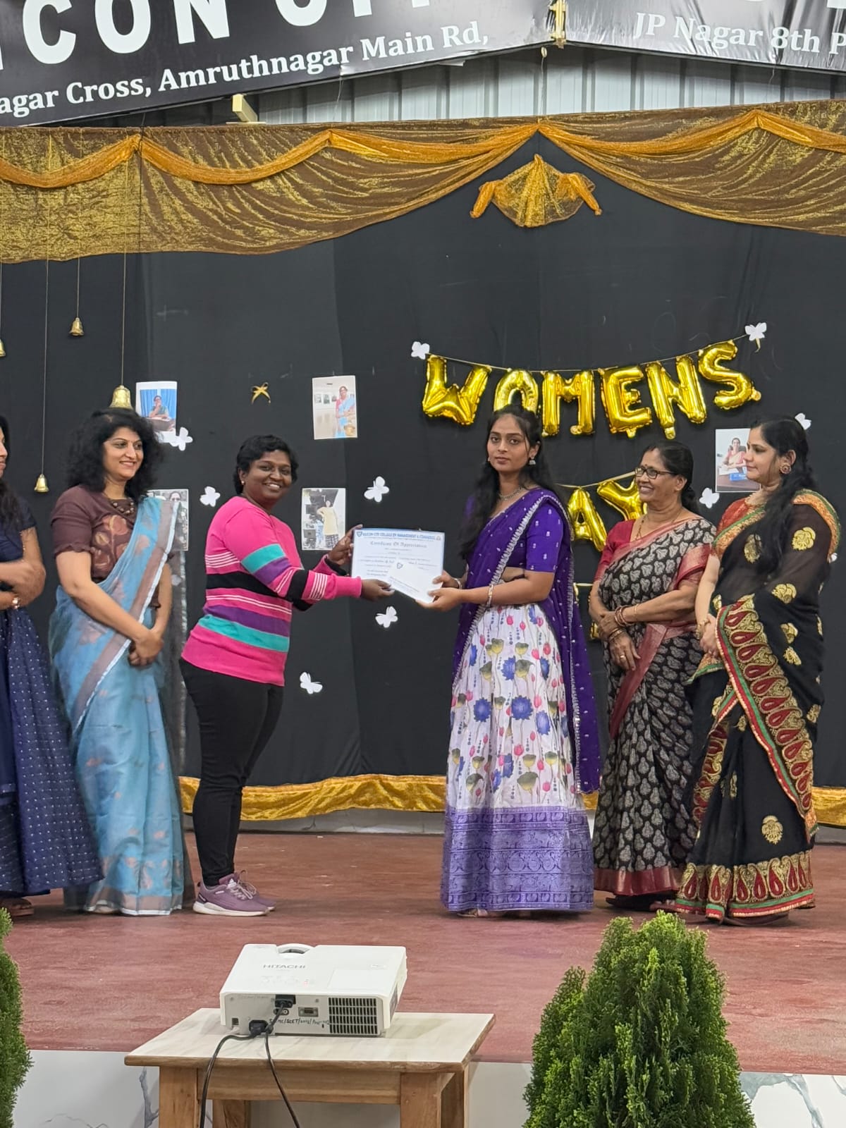 Students receiving appreciation awards for academic and leadership achievements