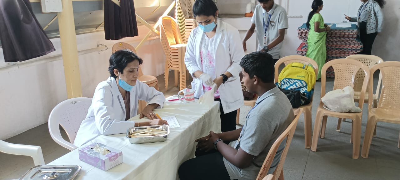 Community members participating in free health screening