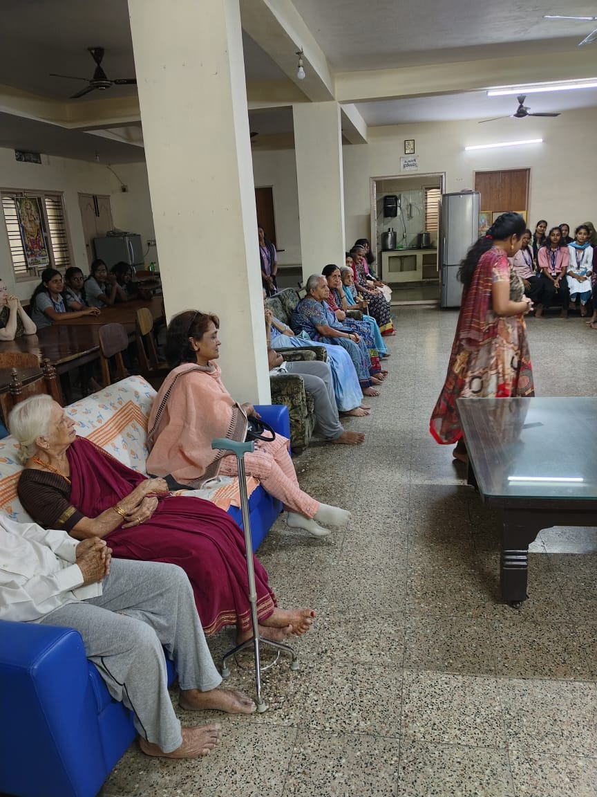 Women volunteers sharing moments with elderly residents