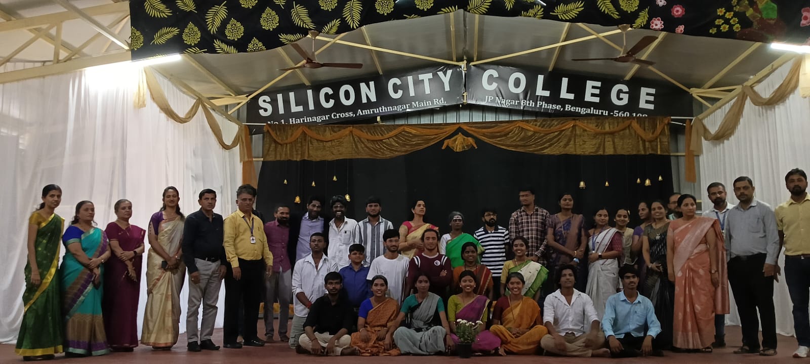 Audience witnessing educational skit on sustainability and impact